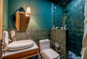 Koupelna v ubytování Folk Boutique Hotel