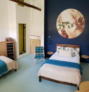 Postel nebo postele na pokoji v ubytování Niños Hotel Fierro