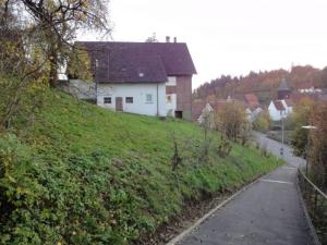 a house on the side of a hill with a road at OG Stetten 