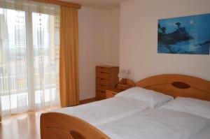 Postel nebo postele na pokoji v ubytování Hotel Restaurant Marko