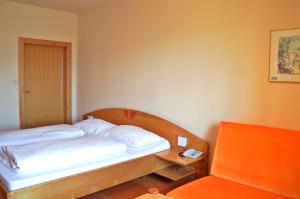 Postel nebo postele na pokoji v ubytování Hotel Restaurant Marko