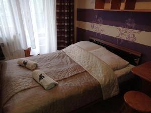 Postel nebo postele na pokoji v ubytování Pod Tatrami