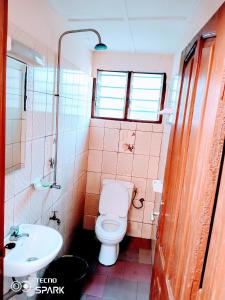 Koupelna v ubytování Akwa Guesthouse Cotonou