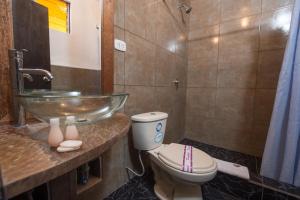 Ett badrum på Hotel Oblitas Plaza de Armas Cusco
