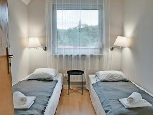 Posteľ alebo postele v izbe v ubytovaní Apartment Górska 54
