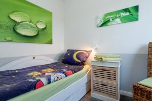 Postel nebo postele na pokoji v ubytování Söhrenhof - Spechtschmiede