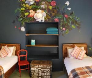 Postel nebo postele na pokoji v ubytování Niños Hotel Fierro