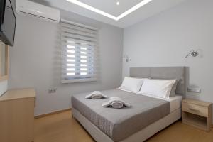 Postel nebo postele na pokoji v ubytování Villa Costa