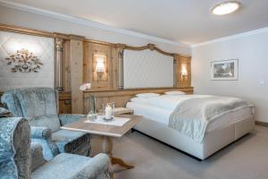 Letto o letti in una camera di Trofana Royal 5-Sterne Superior Resort