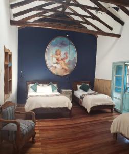Postel nebo postele na pokoji v ubytování Niños Hotel Fierro