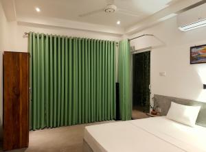 Voodi või voodid majutusasutuse Weligama Bay Watsila Resort toas