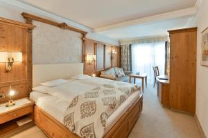 Letto o letti in una camera di Trofana Royal 5-Sterne Superior Resort