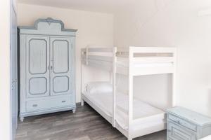Postel nebo postele na pokoji v ubytování LA CORTE SUL LAGO