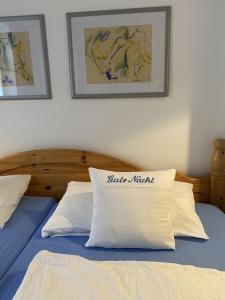 Кровать или кровати в номере Ferienwohnung Nr 04 EG