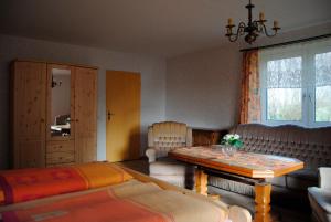 Postel nebo postele na pokoji v ubytování Alte Schule App 3