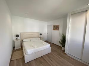 Łóżko lub łóżka w pokoju w obiekcie Residencial Bitacora