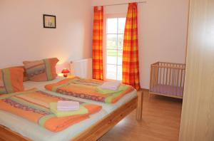 Кровать или кровати в номере "Hof Triangel - Whg 3" - Bauernhofurlaub