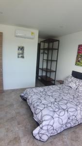 Postel nebo postele na pokoji v ubytování Excelente apartamento Santa Marta Colombia + 22 fotografií