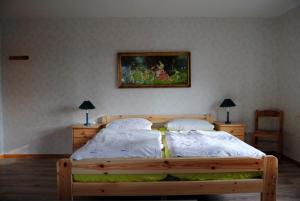 Postelja oz. postelje v sobi nastanitve Alte Schule App 4