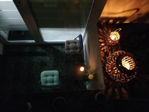 a mirror in a bathroom with a sink and towels at White house in Malbork +3 photos