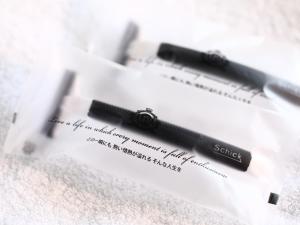 two pencils sitting on top of a piece of paper at APA Hotel Nambaminami Daikokucho Ekimae in Osaka