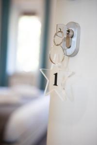 A bed or beds in a room at CASA STELLA San Sisto