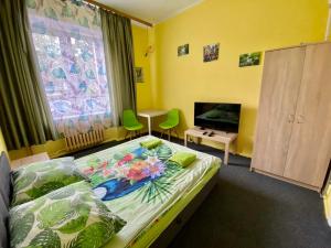 Posteľ alebo postele v izbe v ubytovaní Bon Voyage Apartments