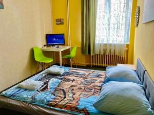 Televízia a/alebo spoločenská miestnosť v ubytovaní Bon Voyage Apartments