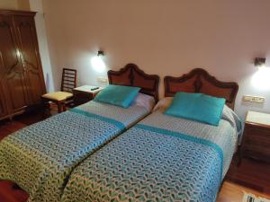 Säng eller sängar i ett rum på KABIXA ETXEA Casa Rural, Lekeitio