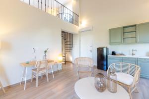 A kitchen or kitchenette at Two Olive Trees - Deluxe Apartments