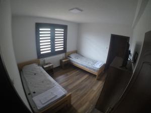 A bed or beds in a room at Vila Marija