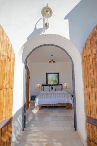 Cama o camas de una habitación en Cisternino Villa in Olive Groove