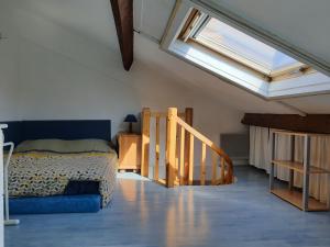 Ένα ή περισσότερα κρεβάτια σε δωμάτιο στο Beau duplex lumineux avec aperçu mer