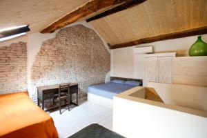 Postel nebo postele na pokoji v ubytování Wehomes- Cozy House - RhoFieraMilano - Parking - self Check-in - Galeazzi - Mind