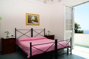 Krevet ili kreveti u jedinici u okviru objekta Hotel Villa Bernardina