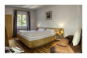 Cama o camas de una habitación en Alpenhotel