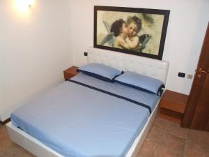 Letto o letti in una camera di B&B Simona