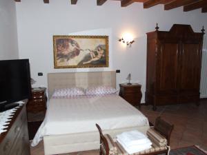 Letto o letti in una camera di B&B Simona