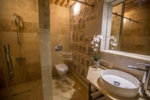 Ein Badezimmer in der Unterkunft Ansia Hotel