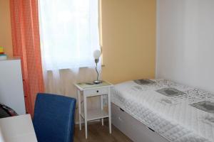 Un pat sau paturi într-o cameră la Seeschwalbe App 34