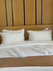 Postel nebo postele na pokoji v ubytování Resort Zerja and Spa