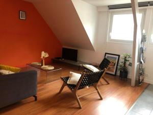 TV o dispositivi per l'intrattenimento presso COEUR DE VILLE - Appartement de charme sous pente