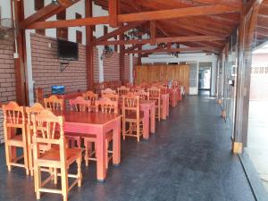 En restaurant eller et andet spisested på Hotel AATRAC Iguazú