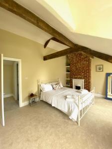 Postel nebo postele na pokoji v ubytování Relaxing cottage in the beautiful Usk Valley