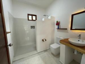 Koupelna v ubytování Gaia Villas + 37 fotografií