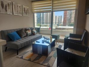 Posedenie v ubytovaní Edificio Medano Con Con