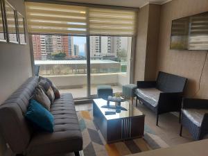 Posedenie v ubytovaní Edificio Medano Con Con