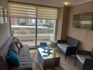 Posedenie v ubytovaní Edificio Medano Con Con