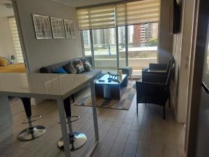 Posedenie v ubytovaní Edificio Medano Con Con