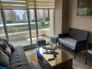 Posedenie v ubytovaní Edificio Medano Con Con